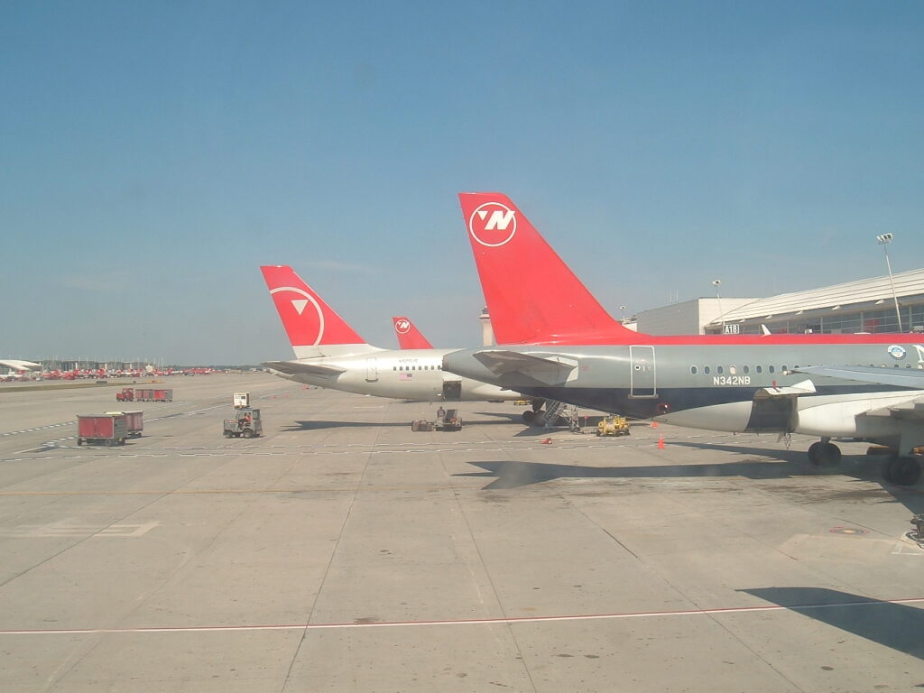 Northwest Airlines Airbus A319-114 N342NB At the gate in DTW next to the Boeing 757-200 I am sitting in.