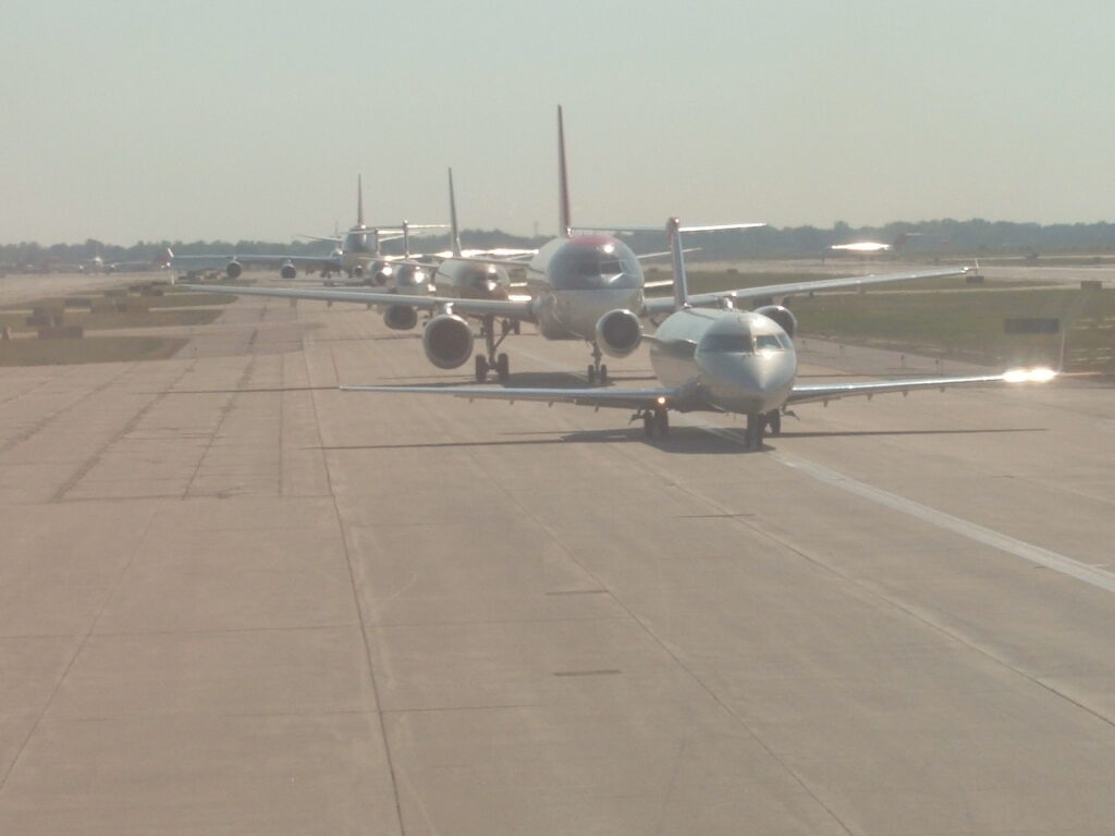 The line of aircraft behind us at DTW waiting to take off 22L.