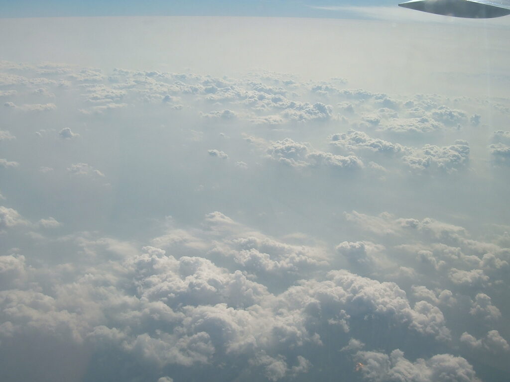 View of various cloud formations over the way to Minneapolis-St. Paul MSP in cruise flight.