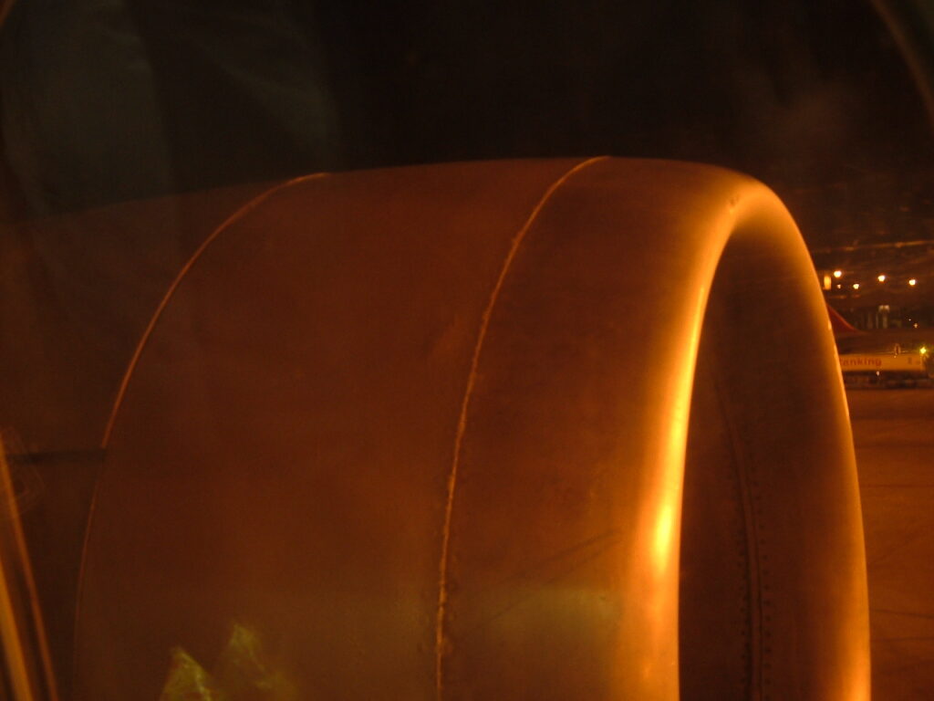 My view of the engine cowling on the Northwest Airlines McDonnell Douglas DC-9-30