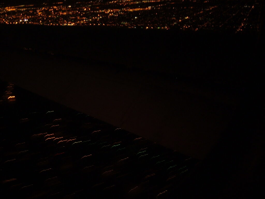 Shot of the wing at night in flight.